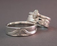 Photo of the Handcarved Signature Wedding Rings by Owen Walker