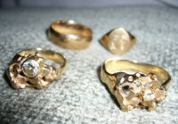 photo of Claires gold rings and diamond for the pendant