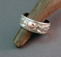 Photo of White Gold Surfing Orca Ring