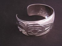 Diving Eagle bracelet hand carved in sterling silver by Owen Walker