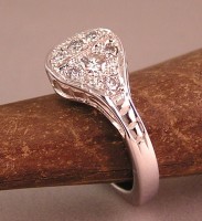 14kt White Gold Horseshoe Nail Ring with diamonds