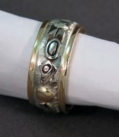 Photo of two color Gold Lovebirds wedding band