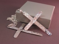 photo of Sterling silver hand engraved crosses