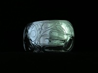 Photo of Hand carved sterling bracelet showing the Eagle end and the Salmon