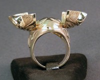 Open view of 14kt yellow gold Raven Transformation Mask Ring