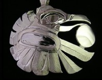 Raven bringing light to the world Hand carved sterling silver pendant by Owen Walker #403